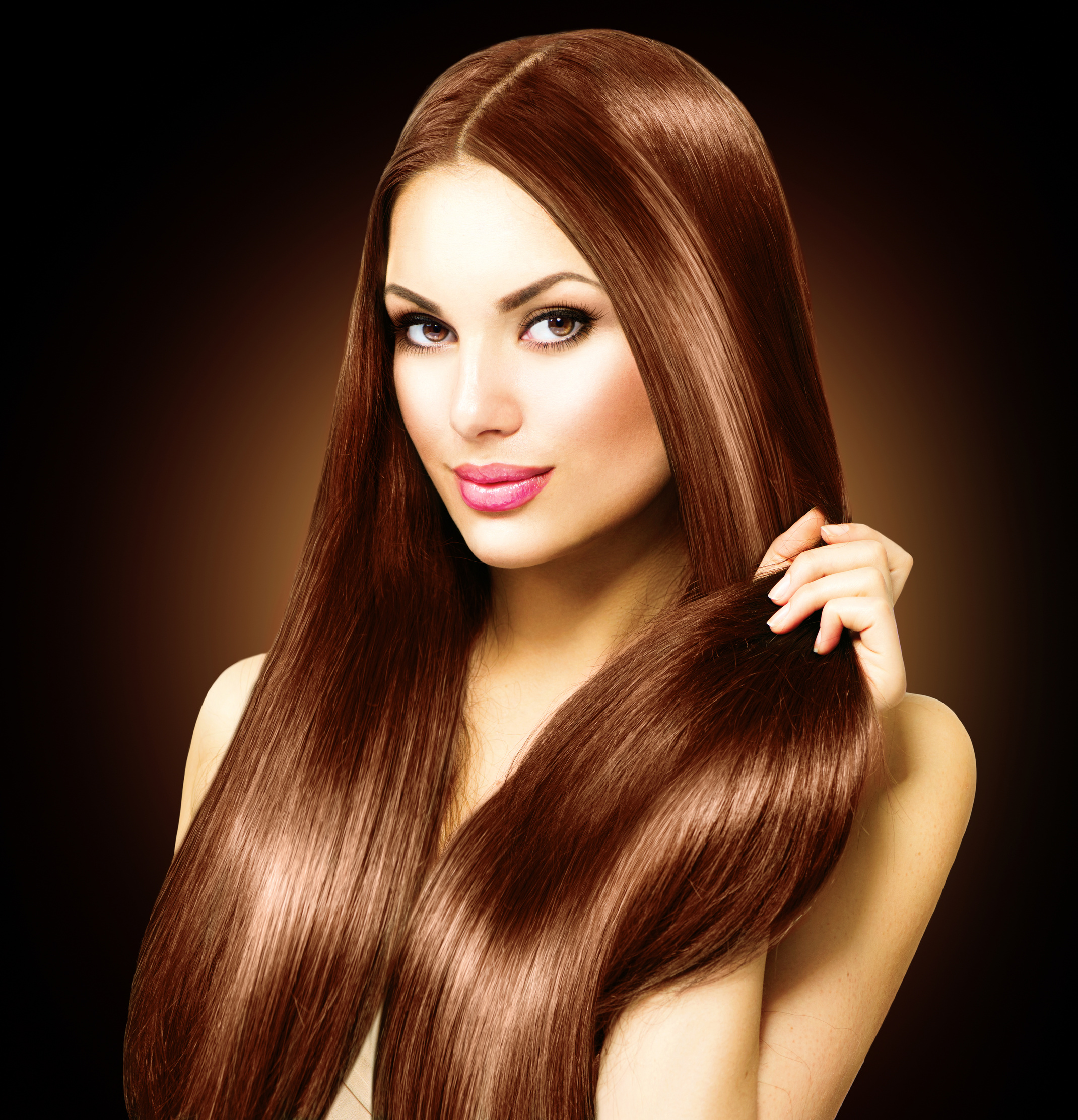 Beautiful Brunette Woman Touching Her Long Shiny Straight Hair